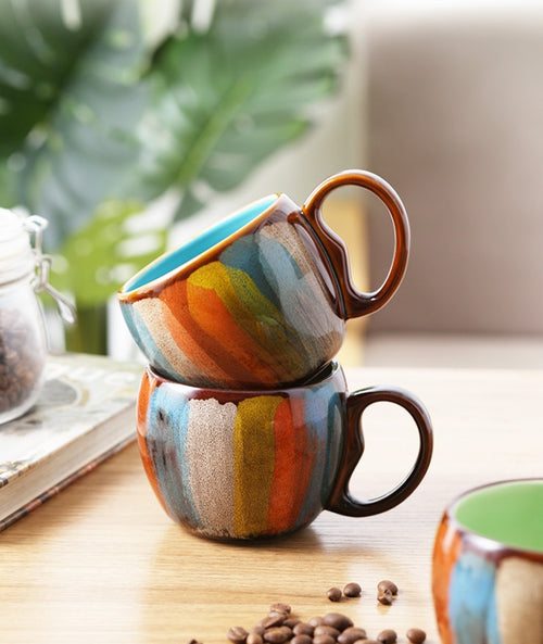 Cheerful ceramic coffee cup with lid and spoon