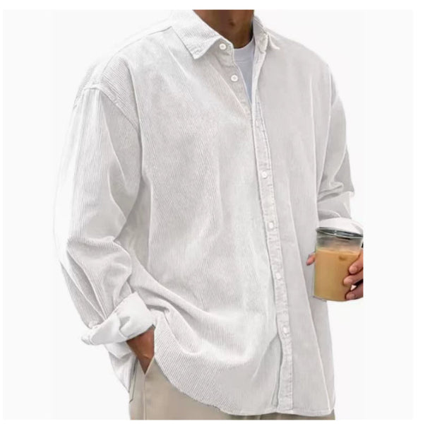 Person wearing a white button-up shirt holding a coffee cup on a white background